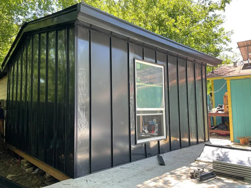 Black standing seam metal wall panels for Metal Roof Installation in Washington Terrace