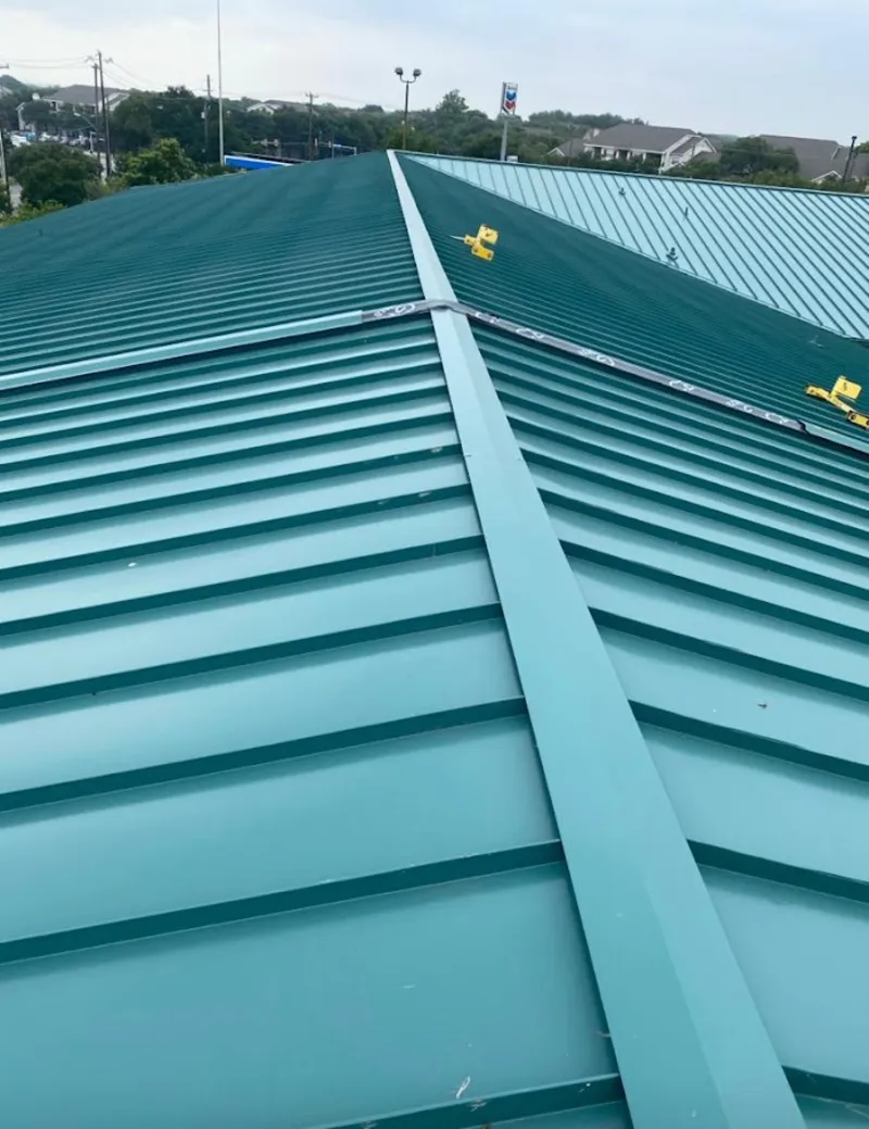 Green commercial metal roof ridge and valley for Metal Roof Repair in Washington Terrace