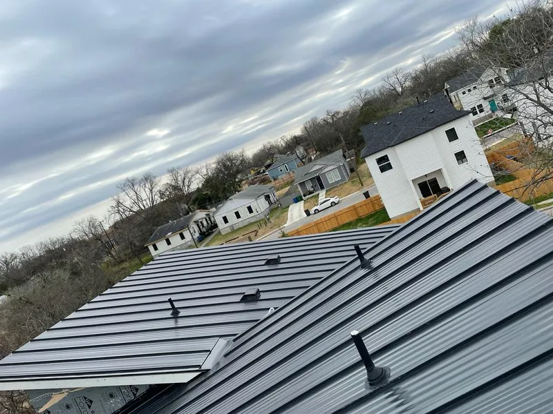 Standing seam metal roof panels with vents for Skylight Repair in Washington Terrace